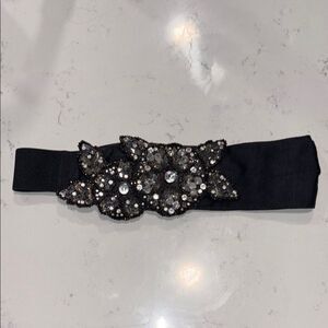 White House Black Market black market elastic belt faux rhinestones size S.